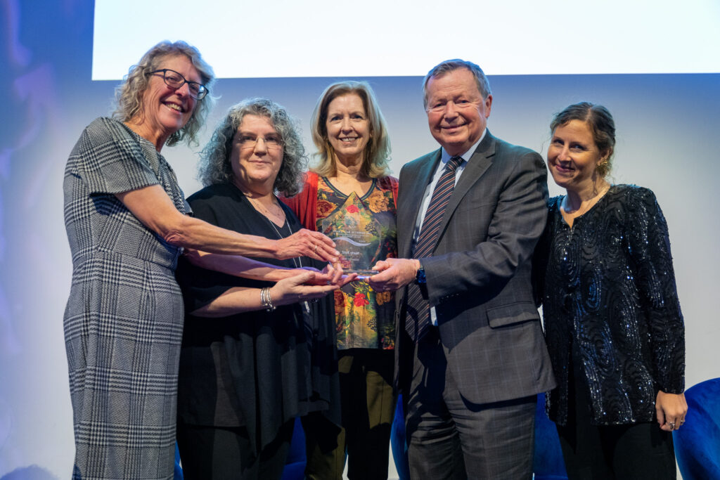 The Ball Award presentation to Marty Ford in absentia included (left to right): Julie Ward, The Arc of the United States, and Merrill Friedman, Academy Board Member and RVP for Inclusive Policy, Elevance Health, who accepted the award on Marty's behalf; Jeanne Morin, Task Force Co-Chair, Consortium for Citizens with Disabilities (CCD); Earl Pomeroy, Fmr. U.S. Representative (D-ND), Senior Counsel, Alston & Bird, and Academy Board Member; and Rebecca Vallas, Academy CEO.